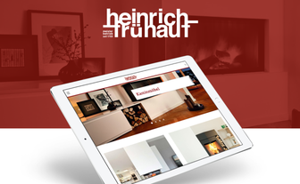 Auf einem Tablet ist die Webseite Heinrich Frühauf geöffnet.